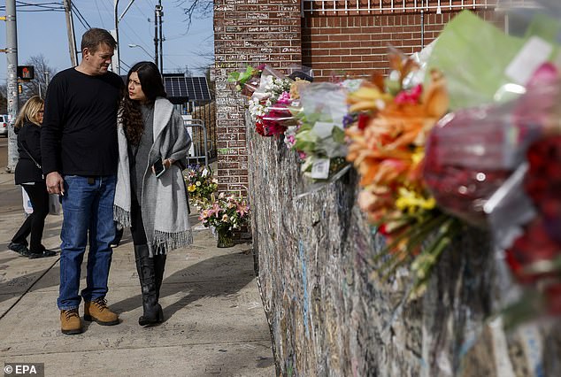 Fans are shown visiting Graceland ahead of the memorial service on Sunday.