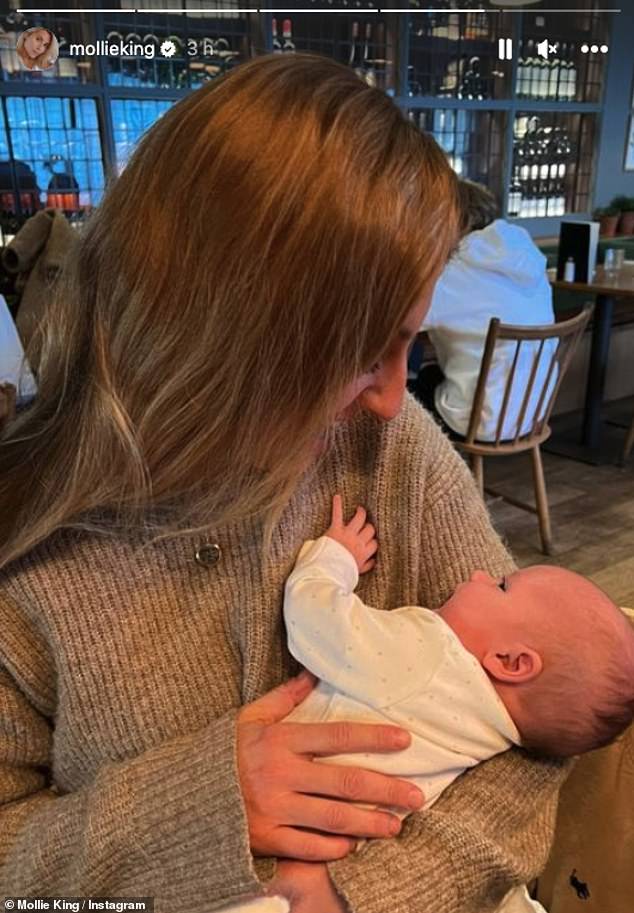 Friend: The blonde beauty looked gorgeous as her cricketer fiancé Stuart Broad, 36, introduced the two-month-old baby to his friend for the first time (Lauren pictured)