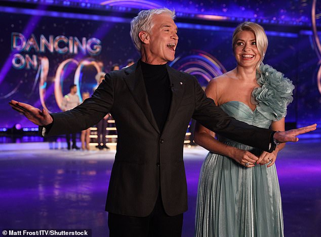 Looking good: Host Holly Willoughby looked amazing in a glamorous blue dress while presenting alongside Phillip Schofield