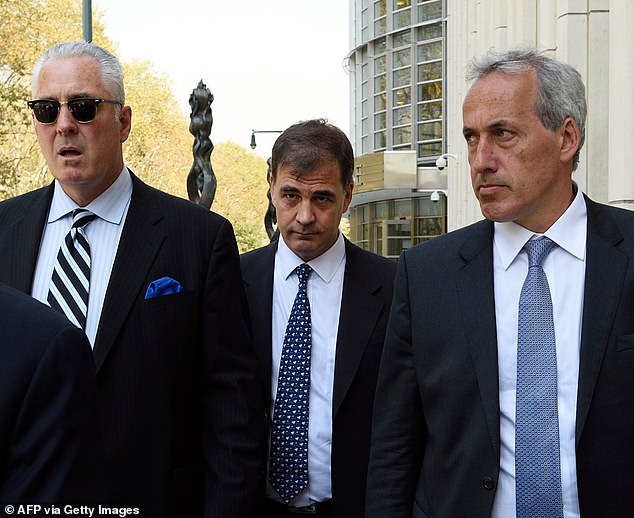 Alejandro Burzaco (C) leaves the United States District Court in Brooklyn on September 18, 2015 in New York.  Burzaco would appear before a judge to respond to charges of bribery and corruption linked to the great FIFA scandal