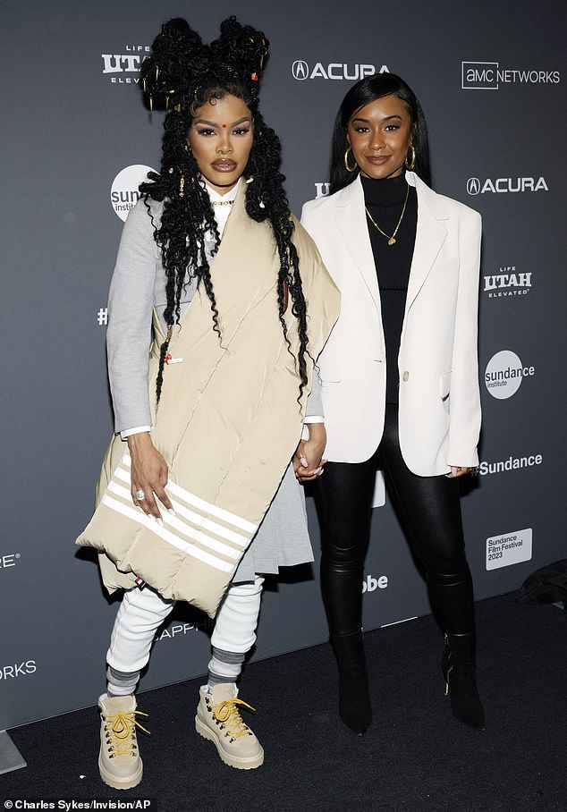 Power Couple: Teyana posed next to A Thousand and One director AV Rockwell, who exuded chic elegance in his white blazer, black turtleneck and skintight black pants.  According to Sundance, Taylor gives a 