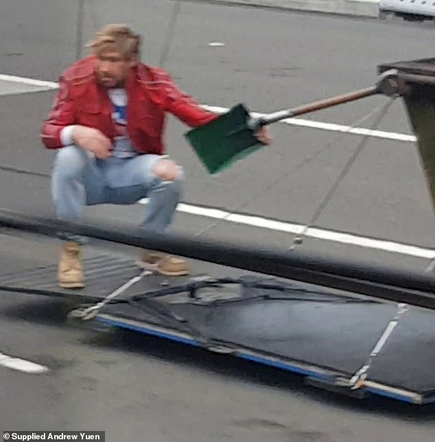 The incredible footage was captured by someone on a passing train as trains crossing the bridge were running as normal despite vehicle traffic being blocked.