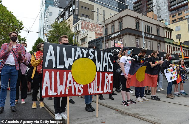 Australians will be asked to vote on recognizing Aboriginal and Torres Strait Islander people in the constitution and formation of an advisory group to advise the government on Aboriginal and Torres Strait Islander issues ( pictured protest against Australia Day date in Melbourne)