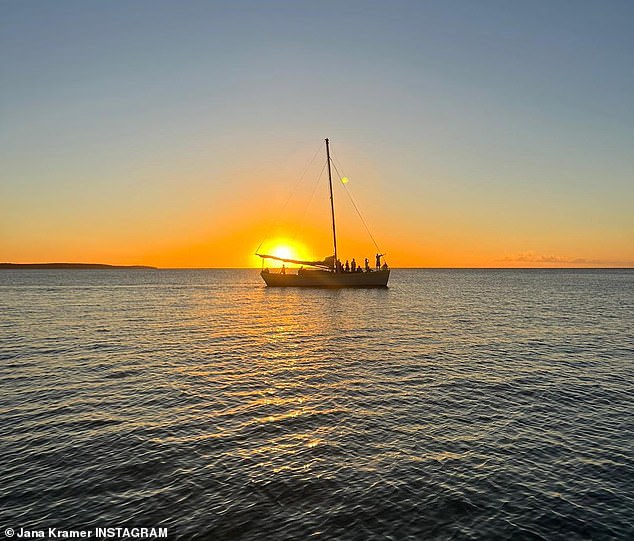 Beautiful Sunset: Jana concluded the photo series with two snapshots of the stunning sunset as another smaller boat slowly passed by.