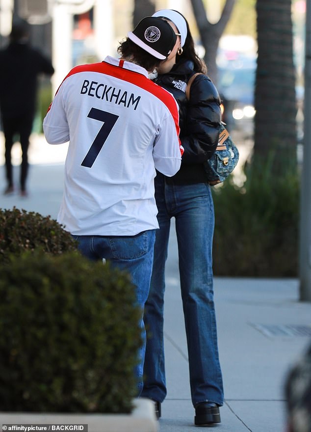 Representing: Brooklyn, 23, donned a long-sleeved T-shirt that sported her soccer star dad's number and name on the back.