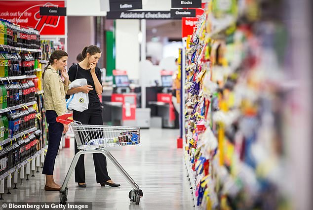 Australians have been warning that the cost-of-living crisis is far from over before another spike in inflation (pictured, shoppers at a Sydney Coles)