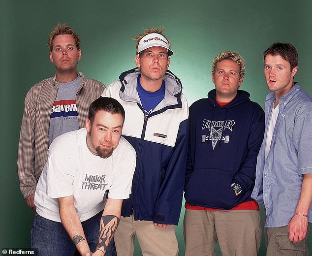 Rocker: Jason's band 'A' (centre) enjoyed mild success in the 1990s and early 2000s with their UK top 20 song Starbucks in 2002 (L-R Adam Perry, Daniel P Carter, Jason, Giles Perry and Mark Chapman)