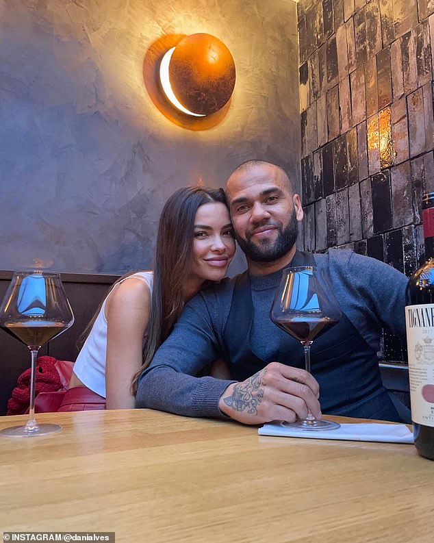 Former Barcelona right-back Dani Alves (D), 39, pictured with his wife Joana Sanz (L), 29