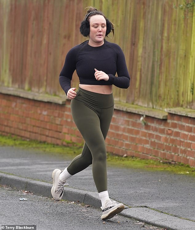 Looking good: The reality star looked determined as she picked up the pace during her outing