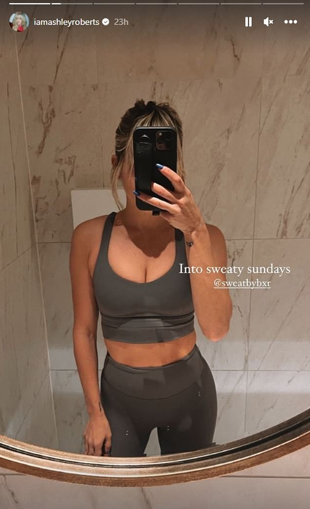 Stunner: Ashley also shared a photo of her workout gear showing off abs in another stunning social media post.