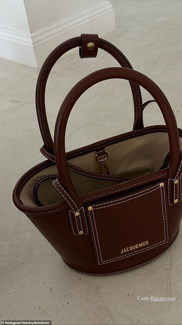 She then revealed the bag itself, which appears to be the brand's mini leather beach basket, valued at $1125.