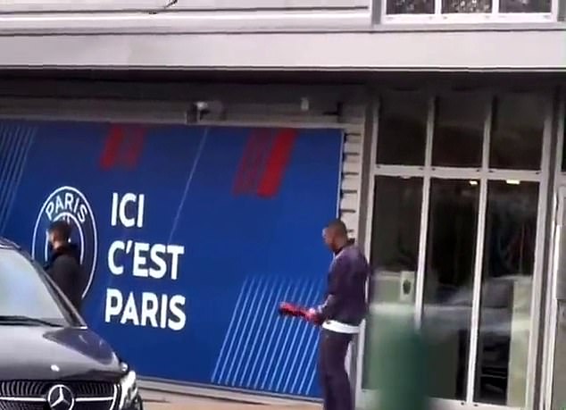 Mbappe is shown appearing to replicate Martinez's trophy celebration at PSG headquarters