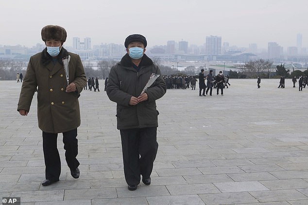 North Koreans visit and pay respect to the statues of late leaders Kim Il Sung and Kim Jong Il on Mansu Hill in Pyongyang, North Korea Sunday, Jan. 22, 2023 on Lunar New Year