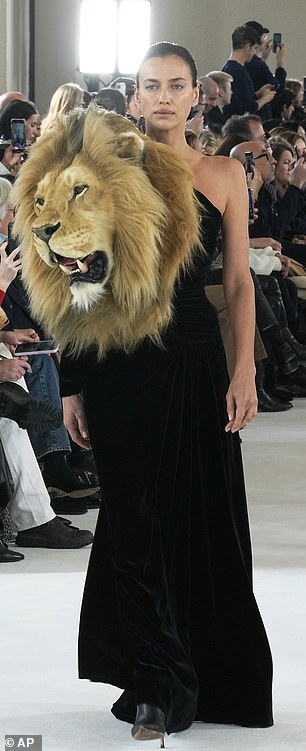 While Irina Shayk also made her mark on the show, strutting around in a one-shoulder black dress with a giant lion's head attached.