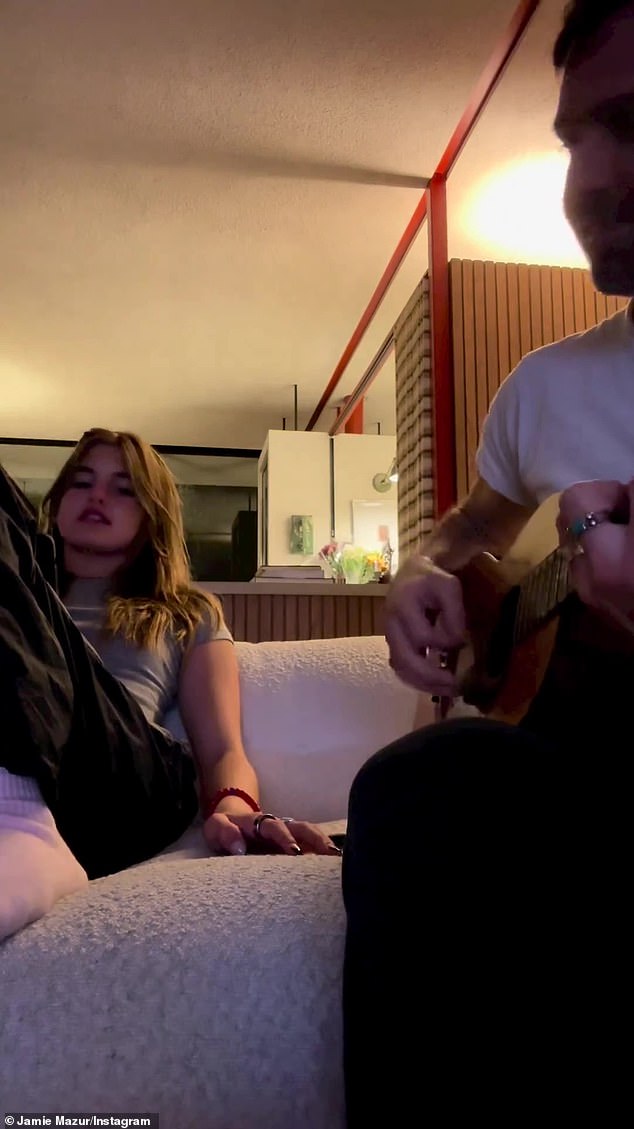 'Where is my head?'  Mazur played acoustic guitar while little Anja showed off her impressive flute for the clip.