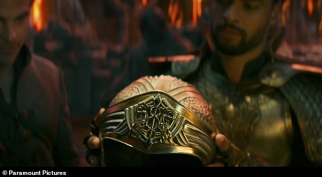 Helmet – He is seen with the rest of his team, played by Page, Rodriguez, Lillis, and Justice Smith, taking on a gold helmet, as Pine adds: 