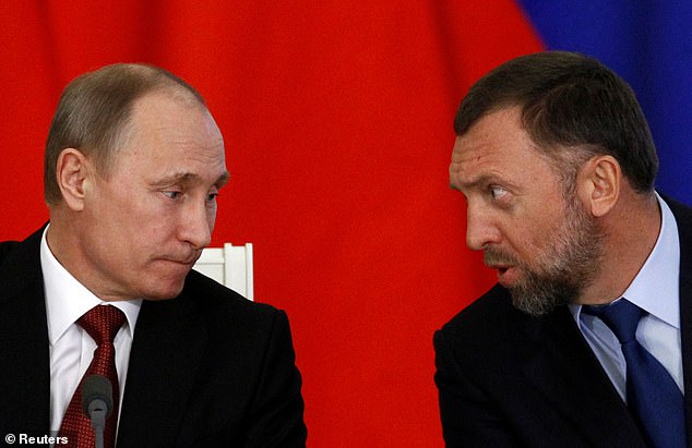 Russian billionaire Oleg Deripaska was sanctioned by the United States and later accused of violating them last year.  In the photo: with Vladimir Putin in Moscow 2013