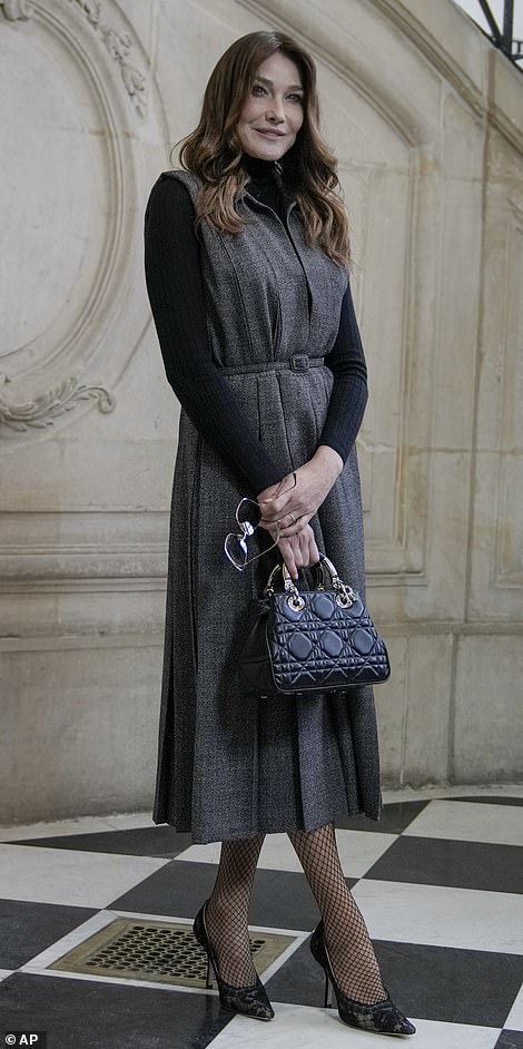 Demure: Carla Bruni attends a photo call ahead of the Dior Haute Couture Spring-Summer 2023 collection presentation in Paris