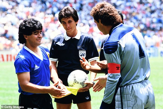 Matchday referee Ali Bin Nasser (centre) has owned the ball since the match in June 1986