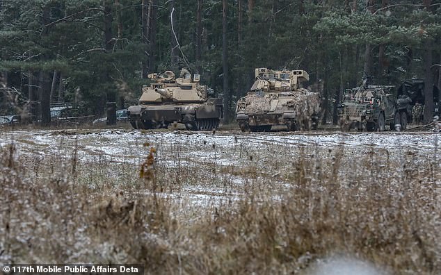 They join growing calls for the US to send its elite Abrams main battle tanks (pictured next to an M3 Bradley infantry fighting vehicle) to the Ukrainian war front.