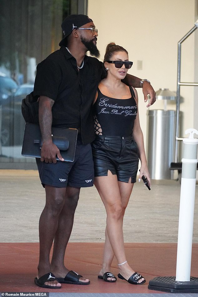 PDA Alert: The 48-year-old has been seen with Marcus Jordan, 32, the son of NBA legend Michael Jordan.