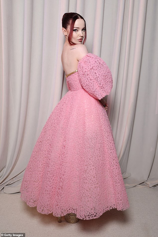 Eye-catching: The 27-year-old actress Dove looked sensational in a bubblegum pink dress with a huge, voluminous skirt and puff sleeves