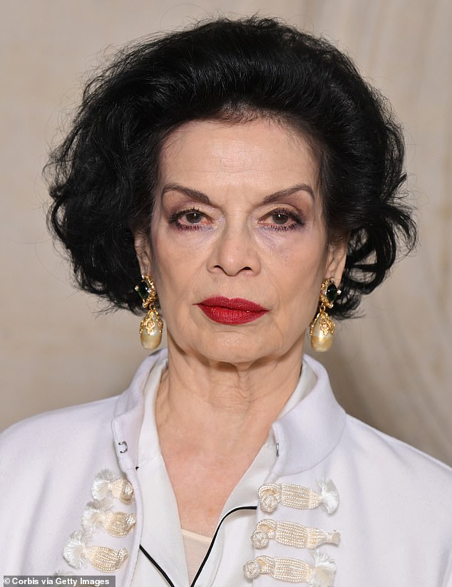 Queen of glamour: Bianca wore her black hair in a 1950s style with little curls at the ends and a scroll on top