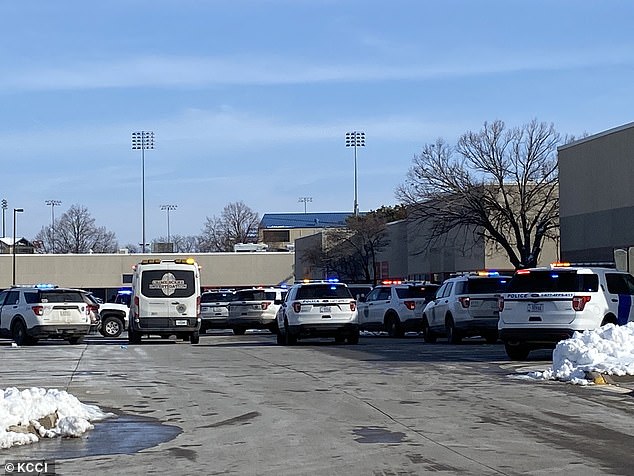 A swarm of police cars on the scene outside Starts Right Here in Des Moines on Monday