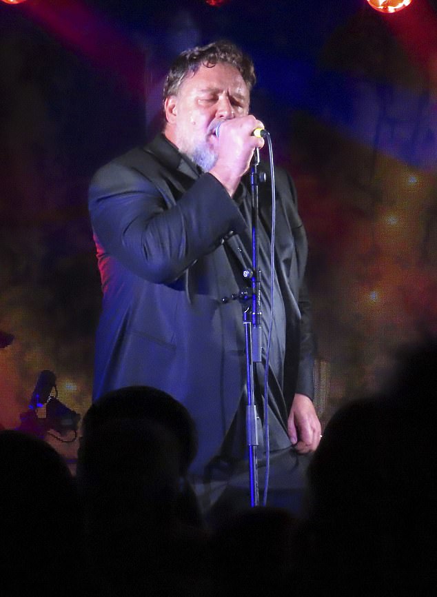 He owned the stage at the Indoor Garden Party, joining his band The Gentlemen Barbers while all dressed in matching black suits.