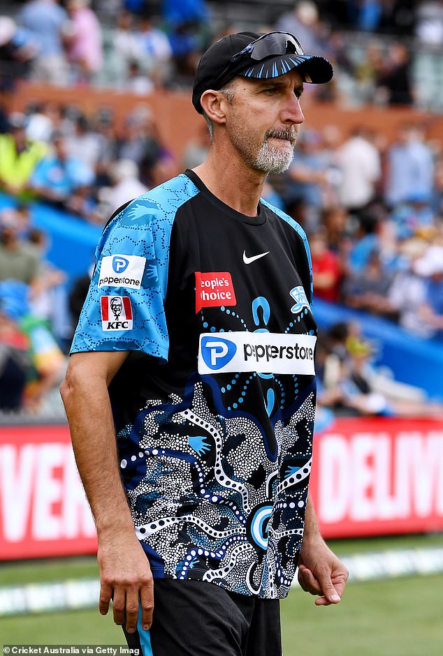 Proud Aboriginal man Jason Gillespie, pictured in Striker's Aboriginal training shirt, believes January 26 should not be celebrated