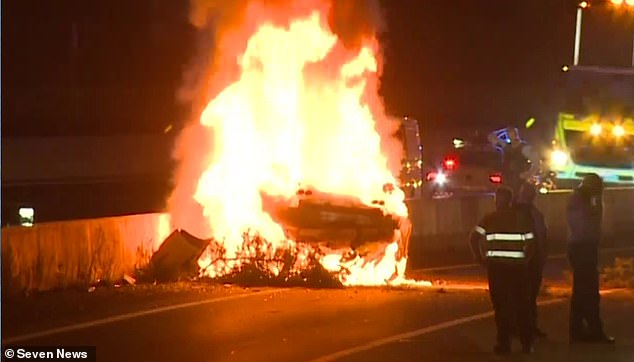 Two people are killed after a silver Audi crashed and caught fire on the M4 in Sydney following a chase with police.