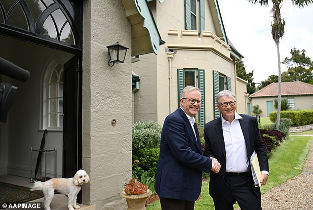 Prime Minister Anthony Albanese (left) and the dog Toto welcomed Bill Gates (right) to their home at Kirribilli House on Saturday.