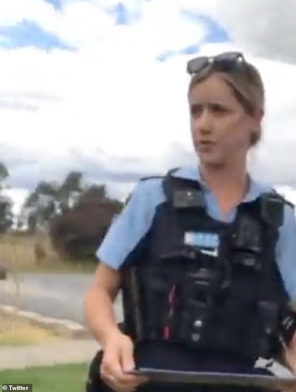 The police officer remains composed in the video as the driver continues his ramblings explaining that their license plates are kept in the car.