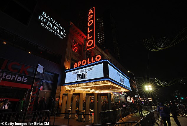 The show was halted for 15 minutes when a man fell from a second-story balcony.