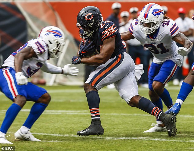 It's unclear if Hamlin will play in the NFL again.  Seen, far right, against the Bears in August 2021