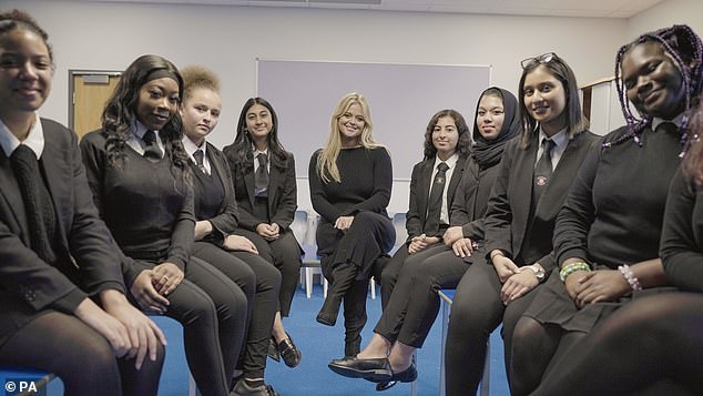 Documentary: Speaking to the Radio Times, Emily said the documentary intensified her frustration as she finds little reason when confronted with the men who send her such horrible explicit messages (pictured talking to schoolgirls for her documentary)