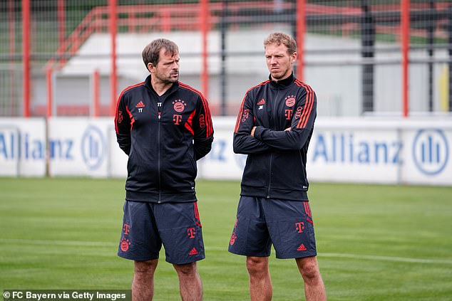 Tensions are said to have risen between Tapalovic (left) and coach Julian Nagelsmann (right) before he was sacked due to 