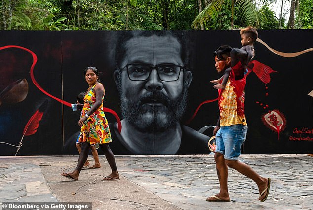 A mural of the late human rights activist Pereira outside an event with indigenous leaders