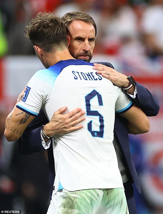 Gutted: The Stones played every minute of England's 2022 World Cup campaign in Qatar before Gareth Southgate's men lost 2-1 to France in the quarter-final.