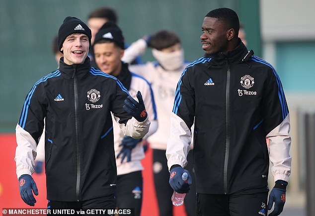 Tuanzebe appeared in good spirits alongside Brandon Williams when he returned to training.