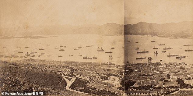 Among the album's 69 black-and-white copies is also a striking double-page view of Hong Kong (above).