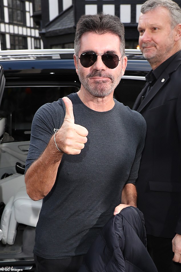 Delgado: Simon Cowell still looked unrecognizable when he arrived at launch with hosts