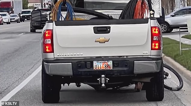 Witnesses say the drunk driver continued down the road with the teen's bike still under his Chevy Silverado pickup, before turning around and ditching the bike in a nearby parking lot.  Eli's bike is seen under the truck in this image taken at the time of the murder.