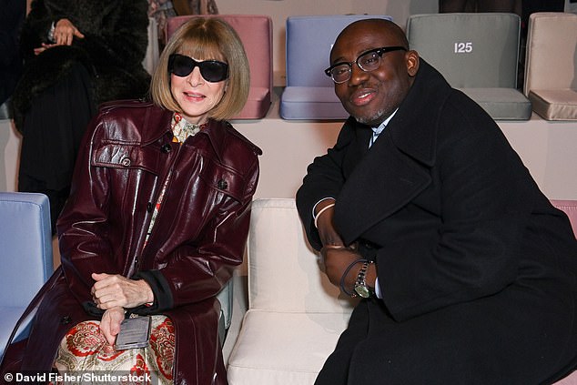 Looking good: Anna chatted with her British counterpart Edward Enninful, who cut a graceful figure in a black coat