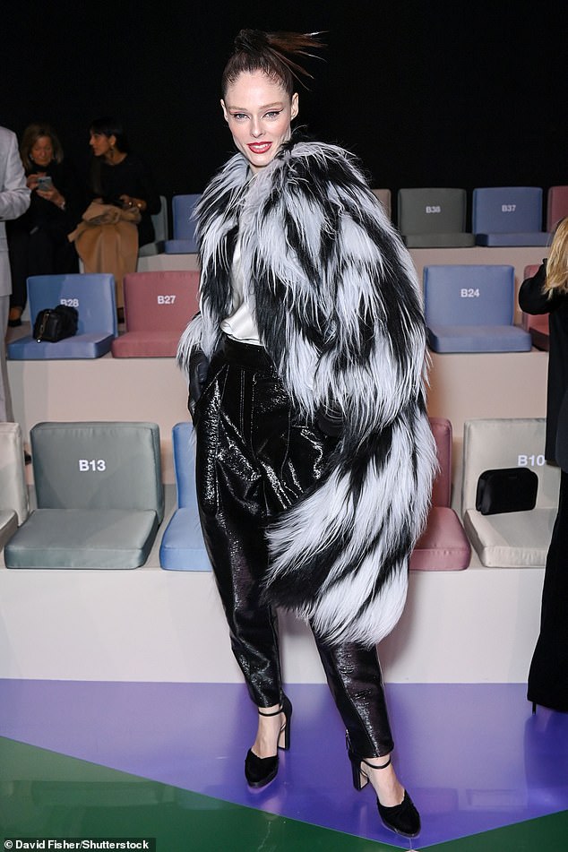 Wow!  While Coco Rocha stood out from the crowd in a huge gray and black faux fur coat and black leather pants.