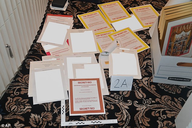 A photo of documents seized during the FBI's search on August 8 of former President Donald Trump's Mar-a-Lago property.  The investigation into the presence of top secret information at Mar-a-Lago continues.