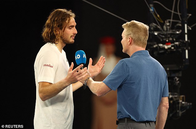 The world number 4 extended the wild card during an awkward on-court exchange with Jim Courier (above) shortly after the end of their quarterfinal match.