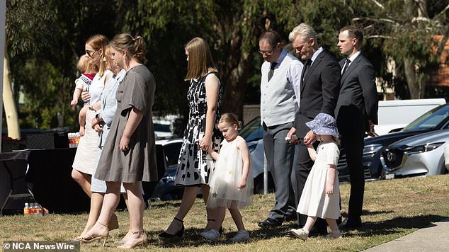 CANBERRA, AUSTRALIA - Newswire Photos JANUARY 25, 2022: A requiem mass will be held to celebrate the life of Senator Jim Molan.  The funeral will be held at St Paul's ANZAC Memorial Chapel in Canberra on Wednesday 25 January 2023. Jim's daughter Erin Molan walked behind her father's coffin carrying her military medals.  Image: NCA NewsWire/Gary Ramage