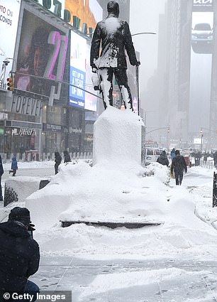 A photo of Times Square, New York, on January 29, shows the city covered in snow.