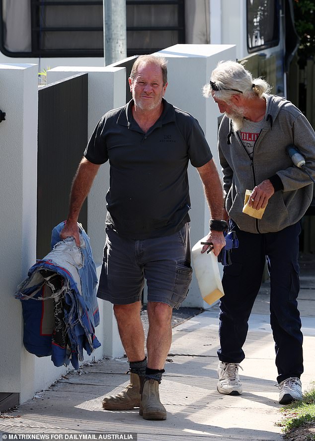 Two builders working next door to Mr Hanslow told Daily Mail Australia that they had been in altercations with him before.